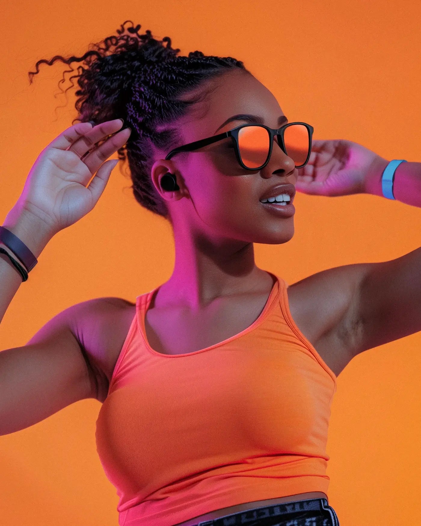 A person wearing open-ear earbuds against an orange backdrop — development artwork