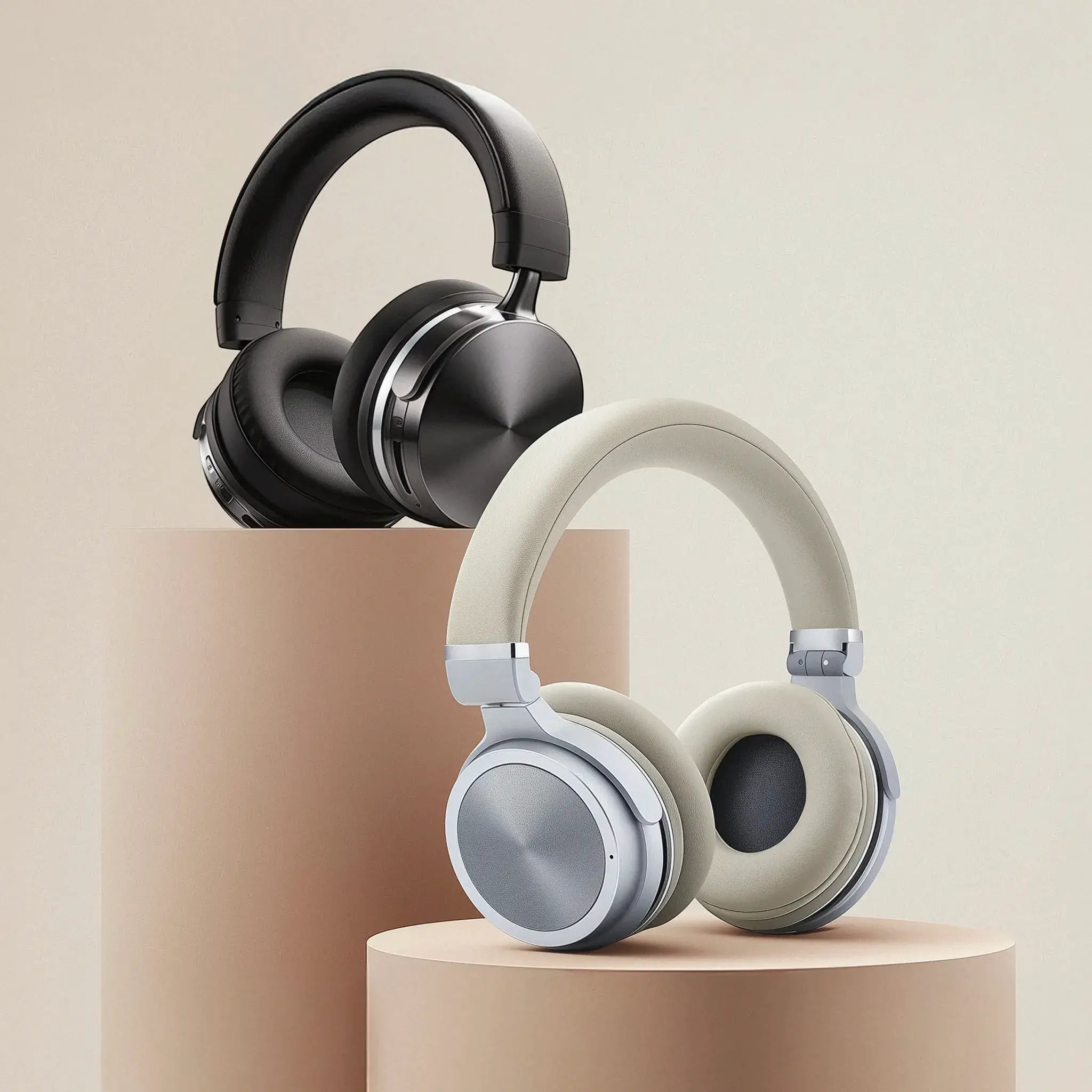 Two pairs of headphones on a plinth — development artwork